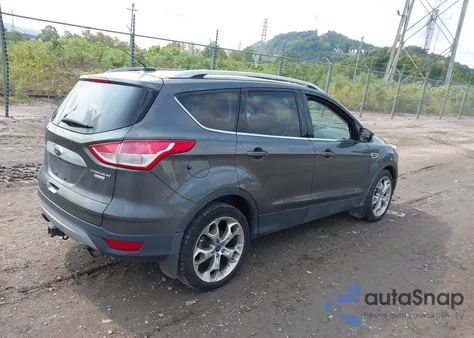 2015 Ford Escape Titanium z USA, uszkodzony, nr VIN 1FMCU9J96FUB11569